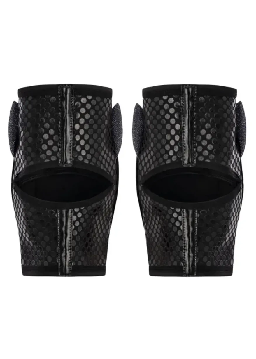 Pair of black, perforated heeled mules with a back zipper detail and circular dot pattern.