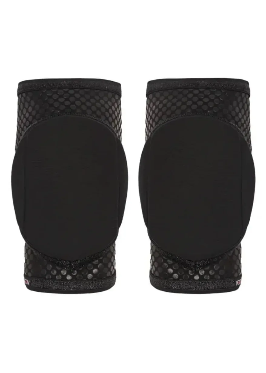 Pair of black knee pads shown from behind, featuring textured dotted bands and hard protective caps on each knee area.