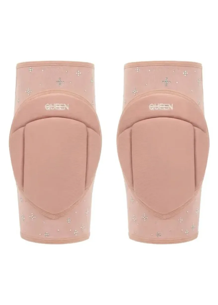 Pink knee pads with small silver studs and 'GUESS' logo on each pad, designed for protective fashion wear at the knees.