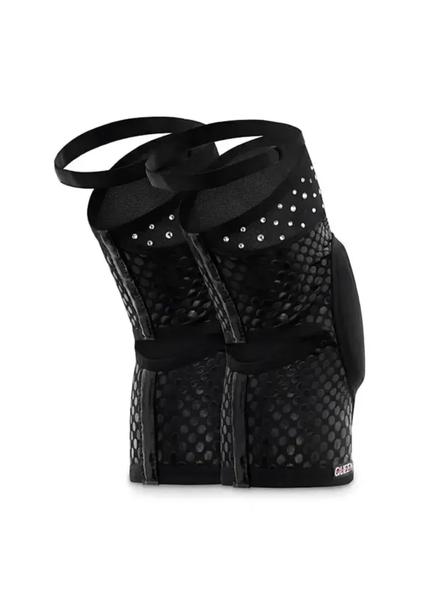 Back view of black, studded ankle boots with double straps and crystal accents; pair shown together on a white background.